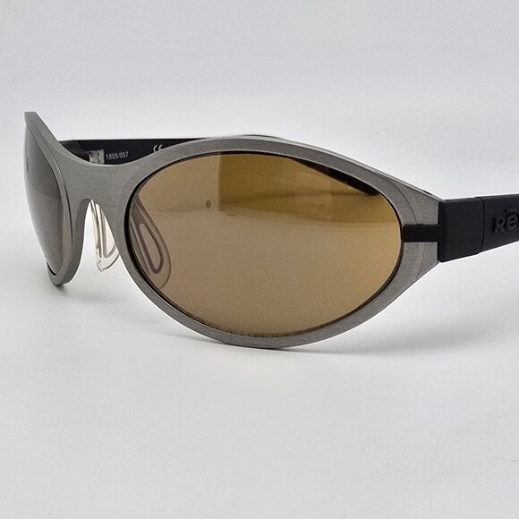 Revo 1805/057 Silver Black Frame Silver Mirror Champaign Gold Lens Sunglasses